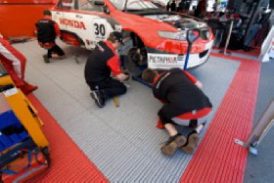 Zeltboden Typ EXPO-roll im Fahrerlager Racing Team - in hellgrau und rot